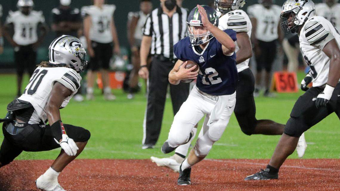 Legion Collegiate’s Andrew Turner tries to avoid Gray Collegiate Academy’s Tory Kelly.