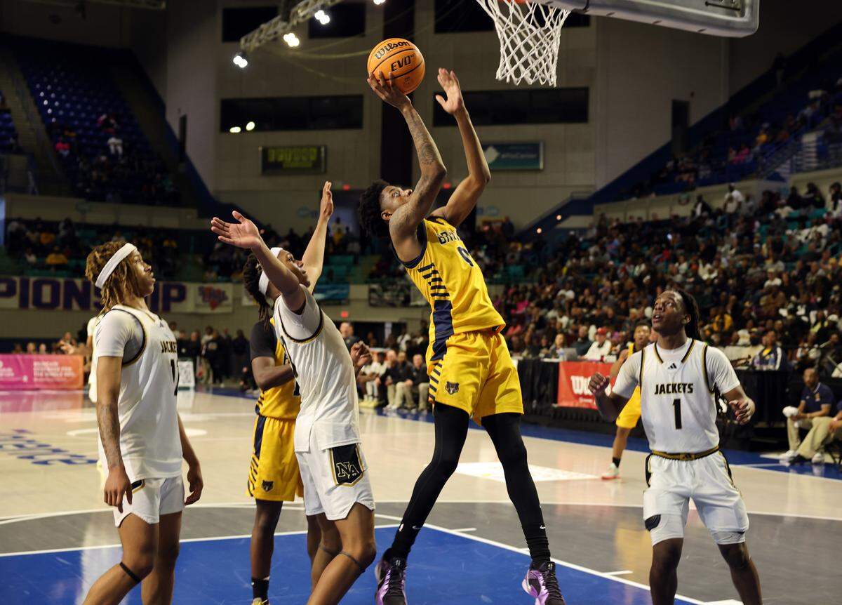 Lancaster’s Jordan Watford shoots the ball Friday at the Class 4A state championships in Florence.