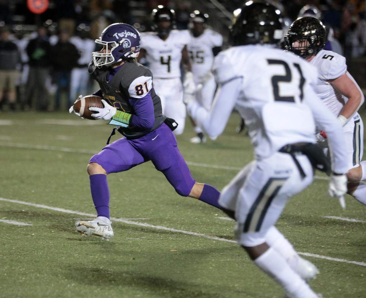 Northwestern’s Drennon Faile (81) heads to the endzone.