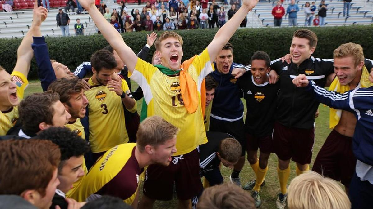 Winthrop senior defender Kyle Kennedy celebrates his team’s Big South men’s soccer championship on Sunday.