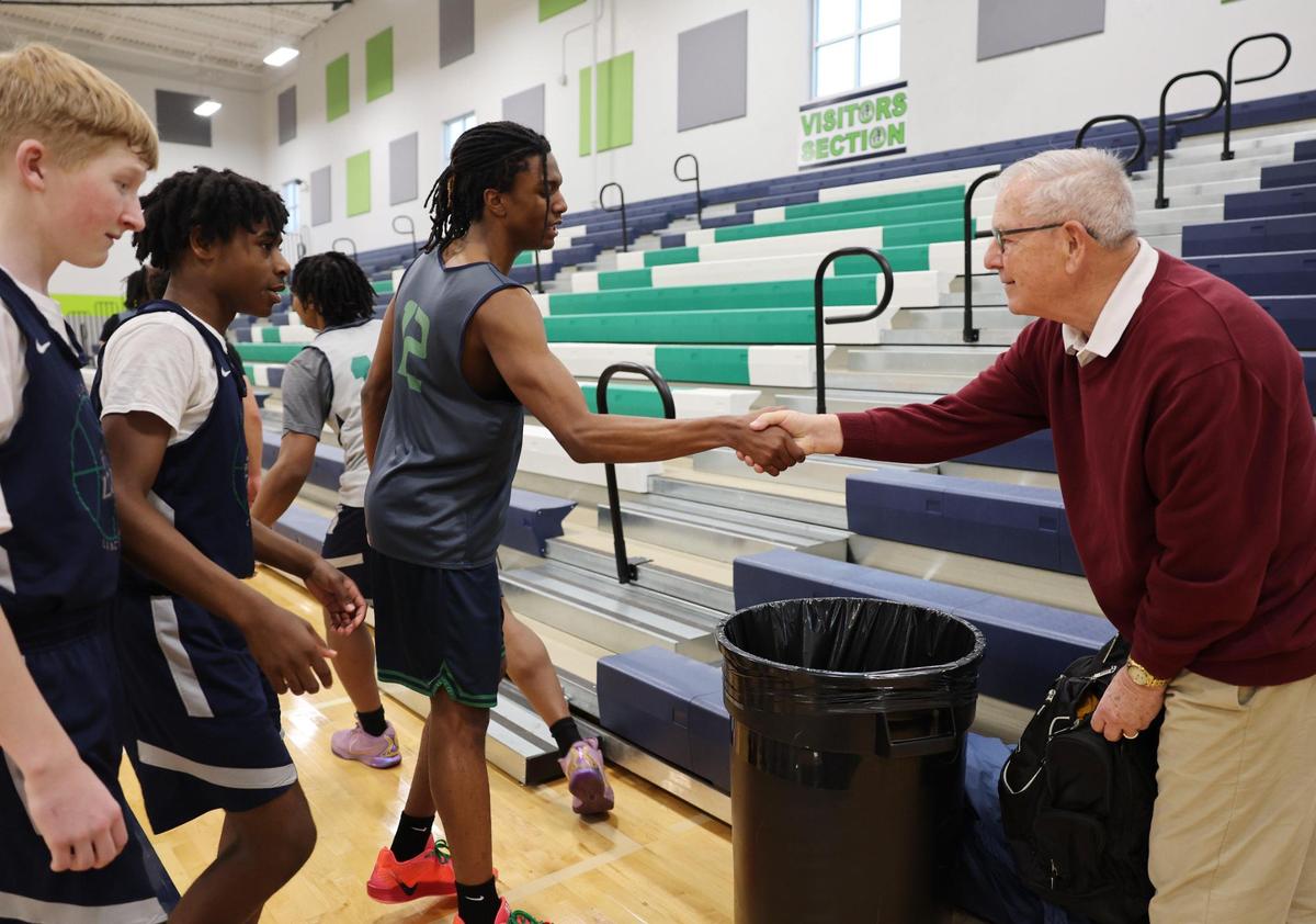 Legion Collegiate Academy students shake hands with Jack Frost. Frost is being inducted into the Winthrop Athletics Hall of Fame on Friday in Rock Hill.
