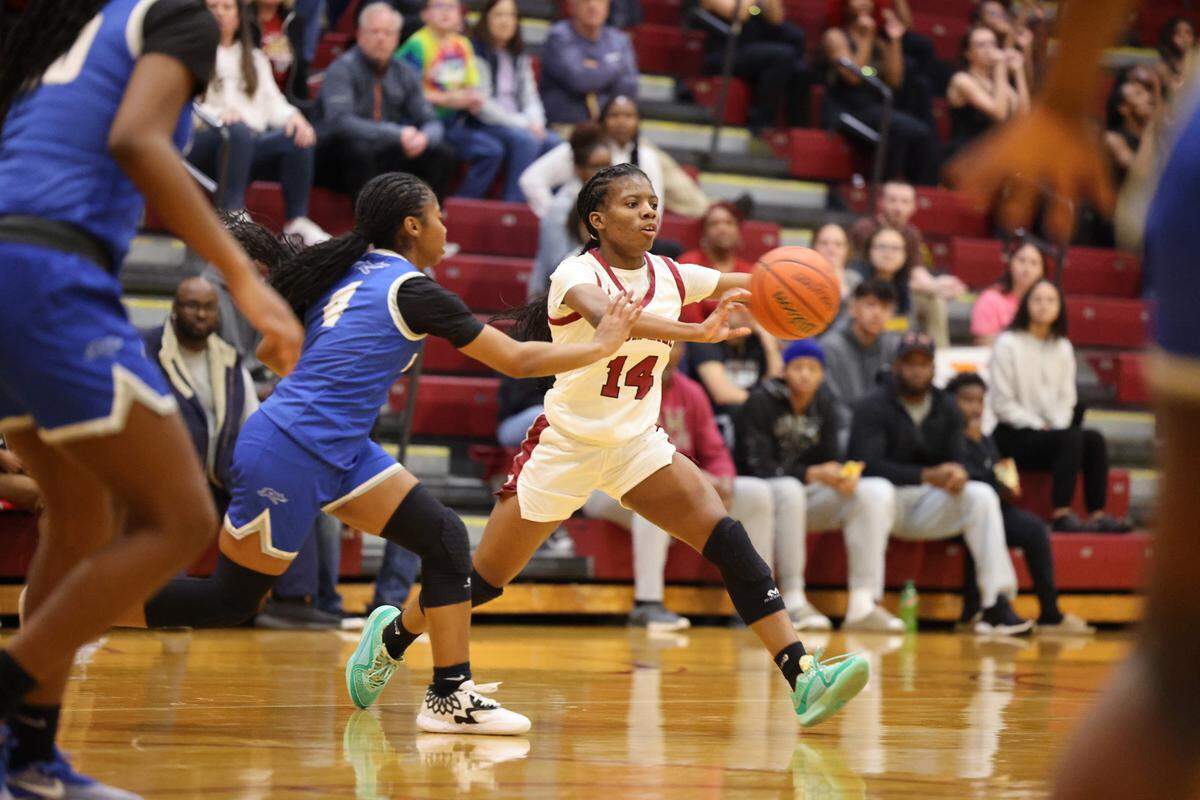 Rock Hill’s De’Ashaj Crawford (14) passes the ball against Byrnes’ Timmerian Miller.