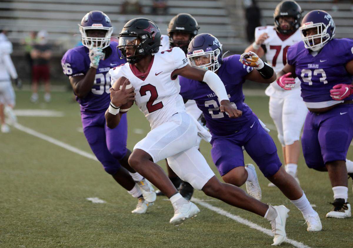 Herald file: Rock Hill’s Matthew Wilson carries the ball against Northwestern in August 2021. The sophomore quarterback will lead the Bearcats against Northwestern on Friday (Oct. 29).
