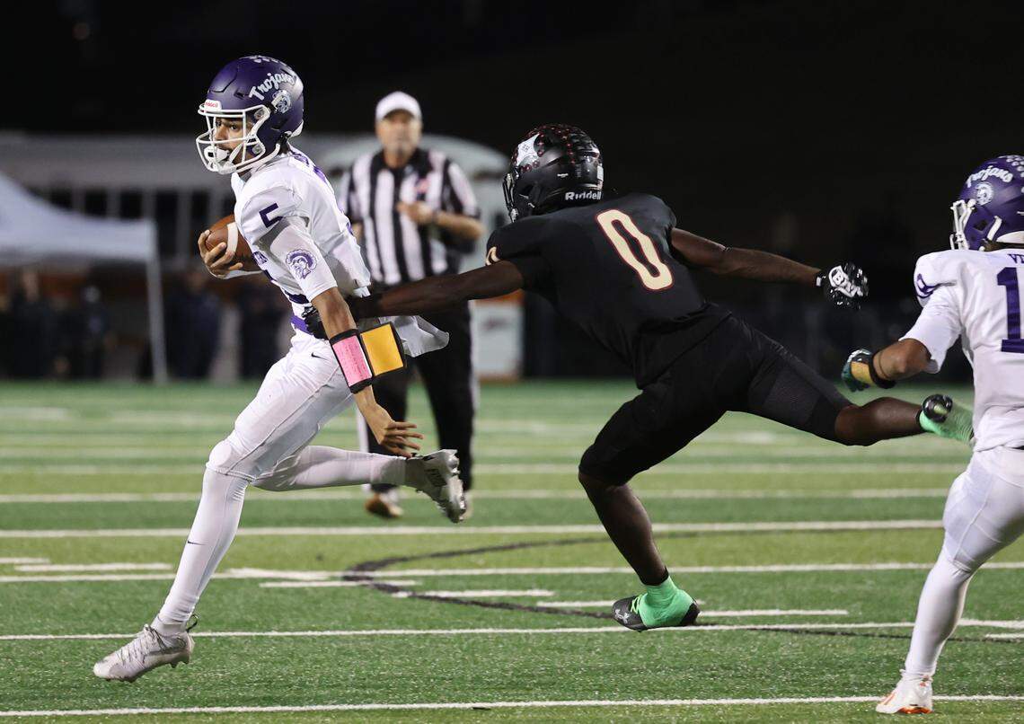 Northwestern's Xavier Means carries the ball against Rock Hill's Kimari Barber Friday, Oct. 17, 2025 in Rock Hill, S.C.