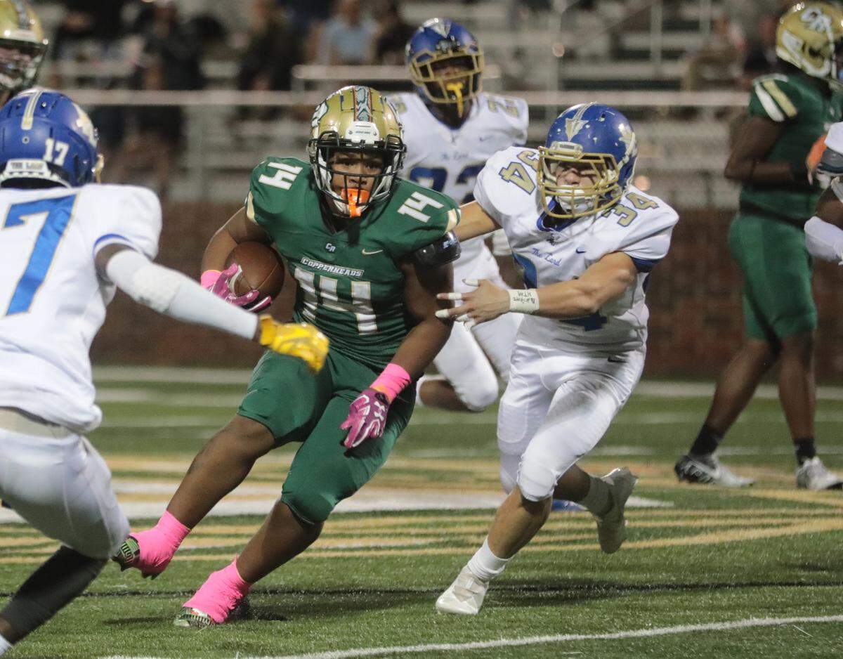 Catawba Ridge’s Tyler Jones is pursued by Indian Land’s Anthony Rodriguez (34).