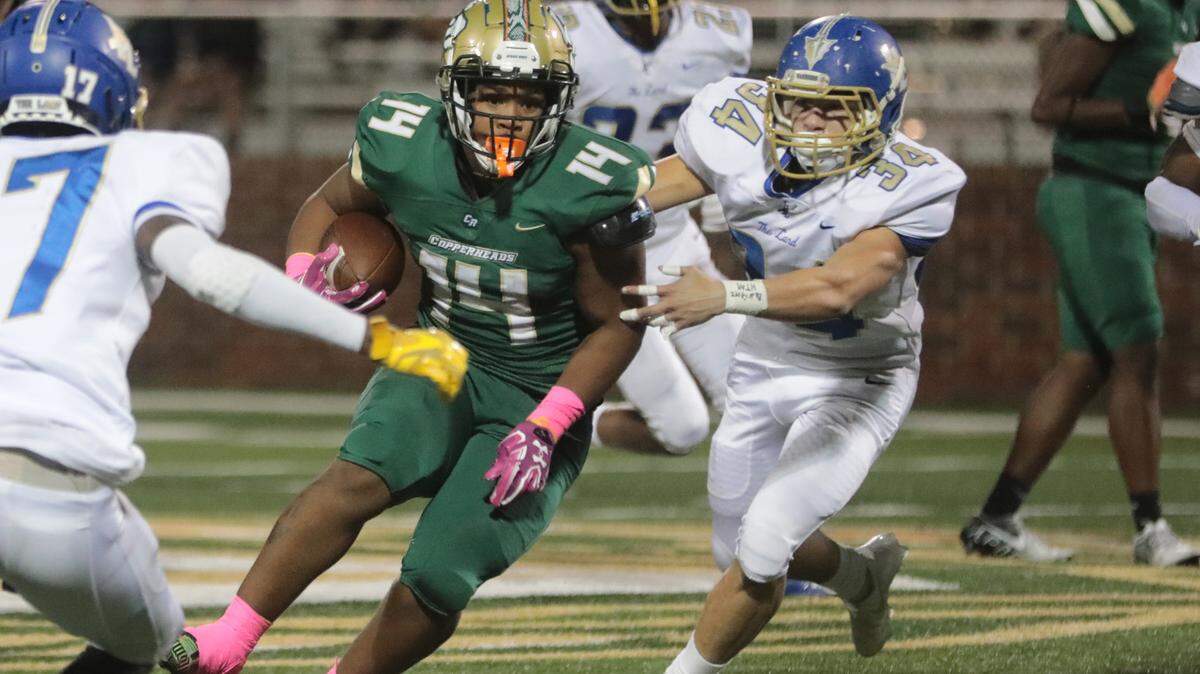 Catawba Ridge’s Tyler Jones is pursued by Indian Land’s Anthony Rodriguez (34).