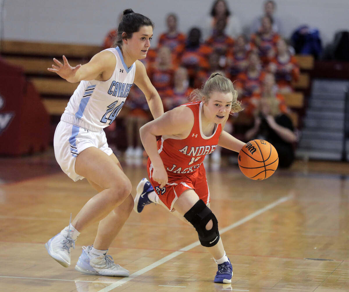 Andrew Jackson’s Emily McCall dribbles up the court against Christ Church’s McCall King.
