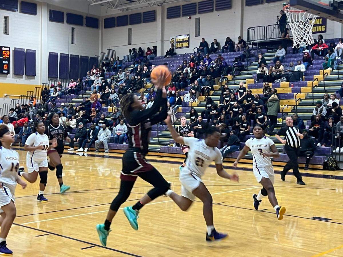 Aubrey Stephenson (black, 0) rises up for a layup in the second-half of Rock Hill’s 71-18 victory over Northwestern on Jan. 5.
