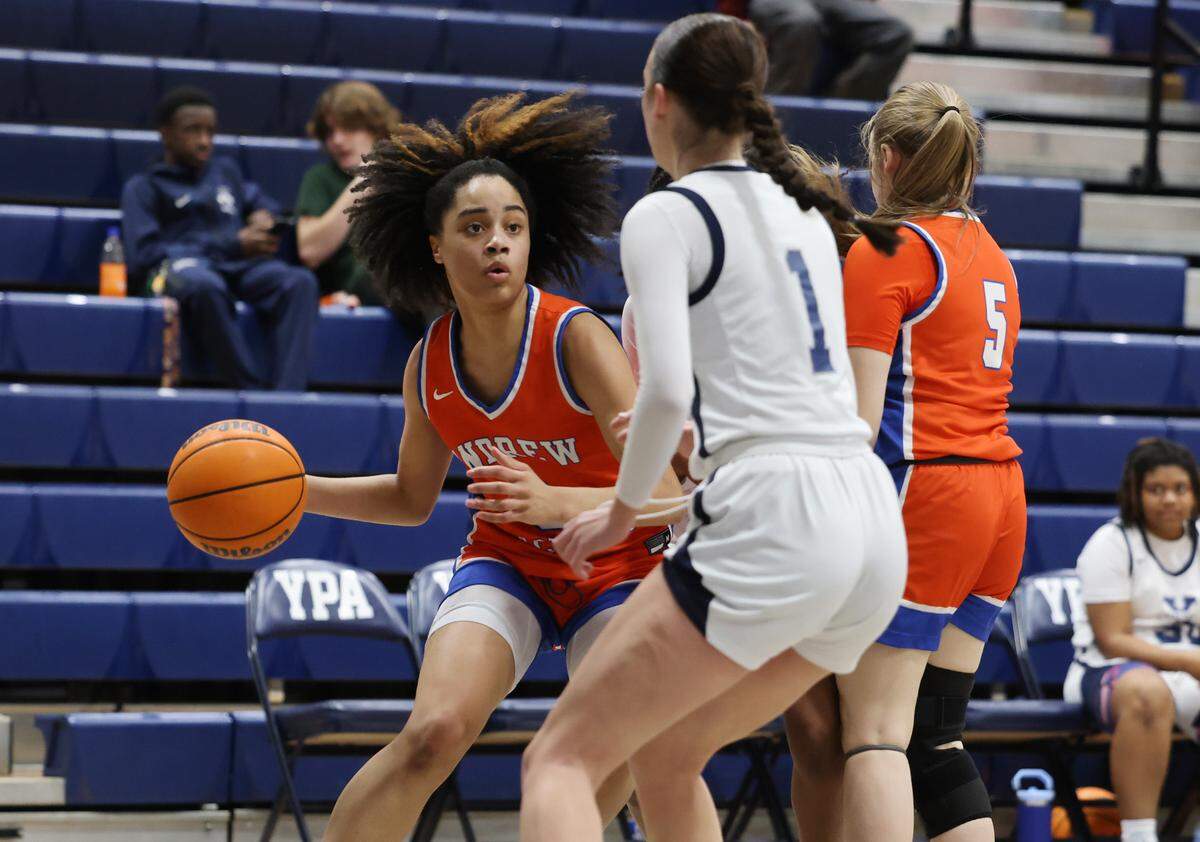 Andrew Jackson’s Ni’Yonna Asbelle looks for an opening around York Prep’s Gracie Robinson.