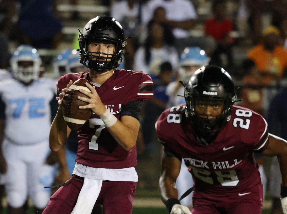 Rock Hill’s Ian Grisson watches Zac Jackson Friday at the WRHI Football City USA scrimmage in Rock Hill.