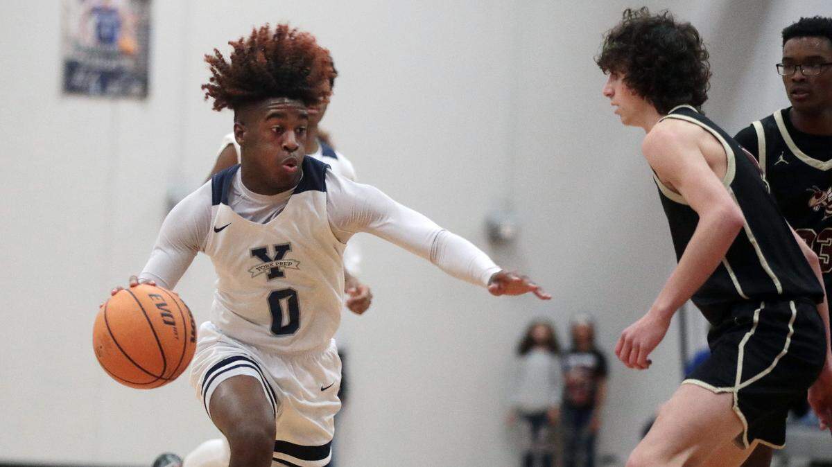York Prep’s Kendall Davis dribbles past Buford’s Brayden Allen.