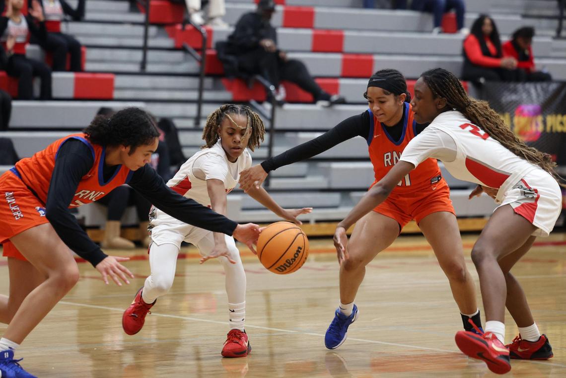 From left, Richland Northeast’s Sasha Cebula, South Pointe’s Kaleigh Lucas, Richland Northeast’s Melanie Walker and South Pointe’s Kemoni Hardy fight for control of the ball Thursday in Rock Hill.