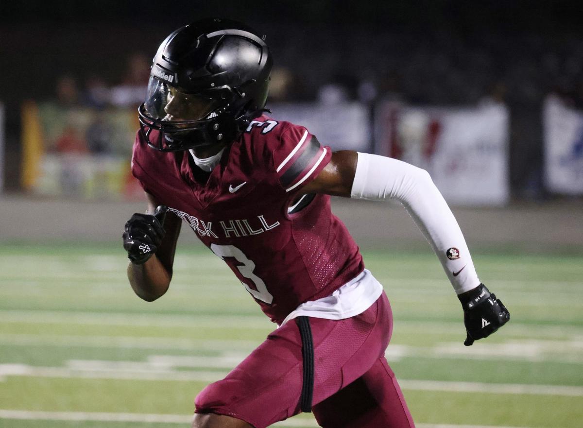 Rock HIll’s Malik Clark plays in the WRHI Football City USA scrimmage Friday in Rock Hill.