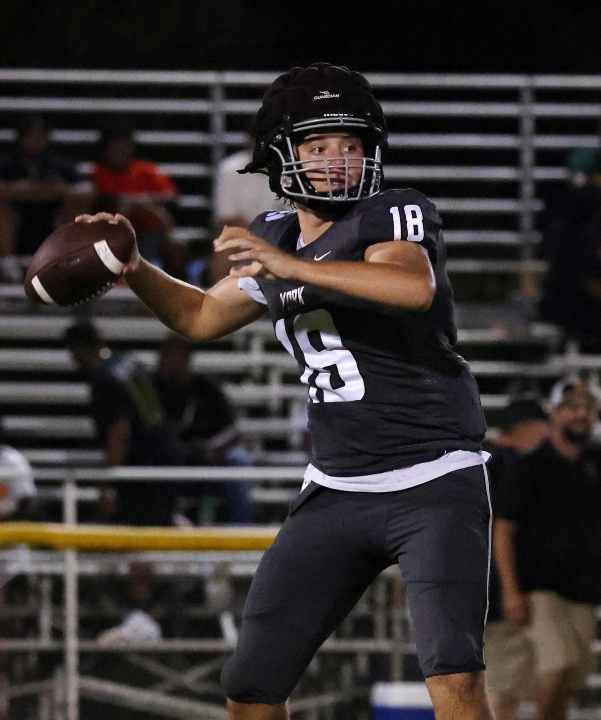 York quarterback Ryan Brochu looks for an opening Friday at a scrimmage in Union.