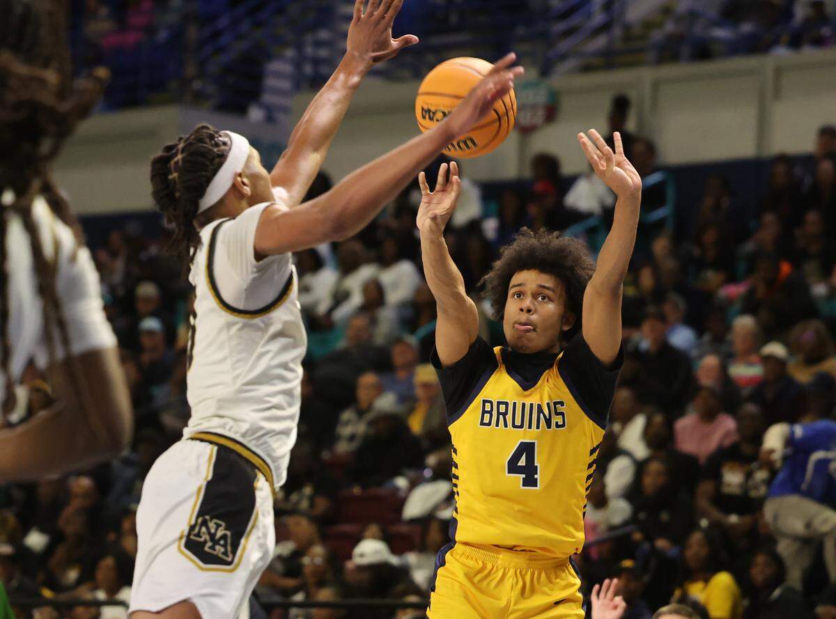 Lancaster’s Columbus Parker shoots the ball as North Augusta’s Daron Dunbar tries to stop it Friday in Florence at the Class 4A state championships