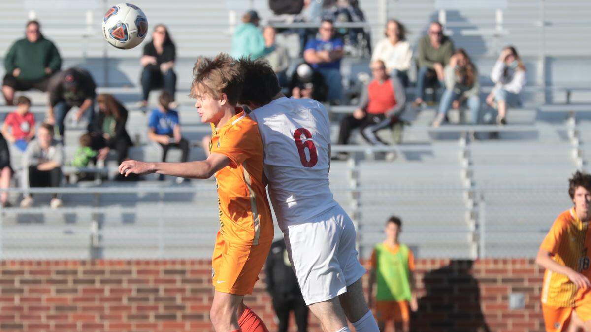 Catawba Ridge’s Joshua White, left, and Matthew Worsham try to gain control of the ball Friday in Fort Mill