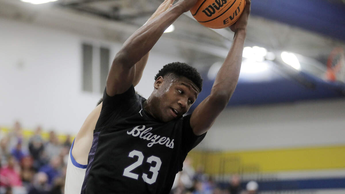 Ridge View’s GG Jackson II gets the rebound Monday as the Yellow Jackets take on the Ridgeview High School Blazers in Fort Mill.