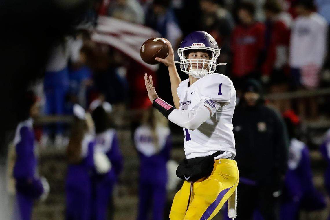 Northwestern quarterback (1) Will Mattison drops back for a pass as Northwestern takes on Rock Hill in Friday night varsity football action, 10-29-2021.