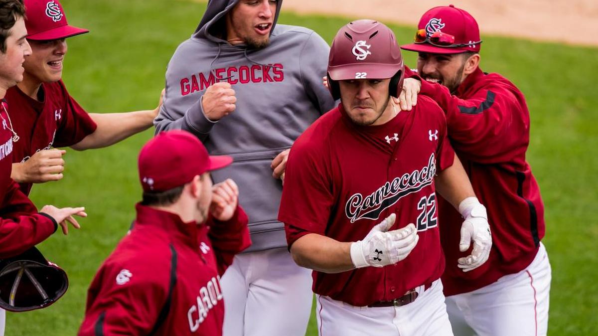 South Carolina designated hitter John Jones (22) celebrates his game-winning three-run home run during the eighth inning Sunday against Arkansas at Founders Park.