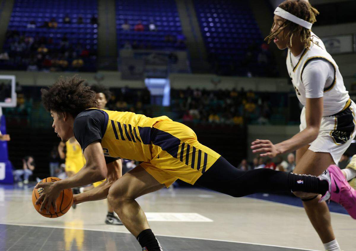Lancaster’s Columbus Parker stumbles Friday at the Class 4A state championships in Florence.
