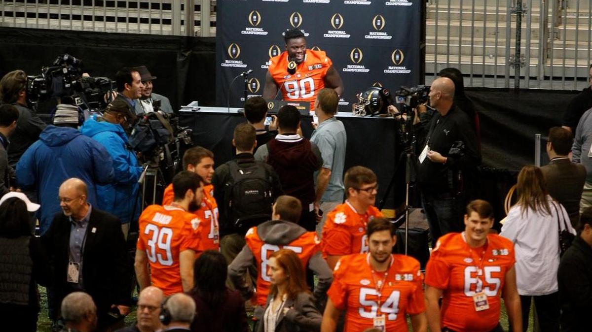 Tigers defensive end Shaq Lawson answers questionsSaturday. Lawson said he will play through an injury on Monday.
