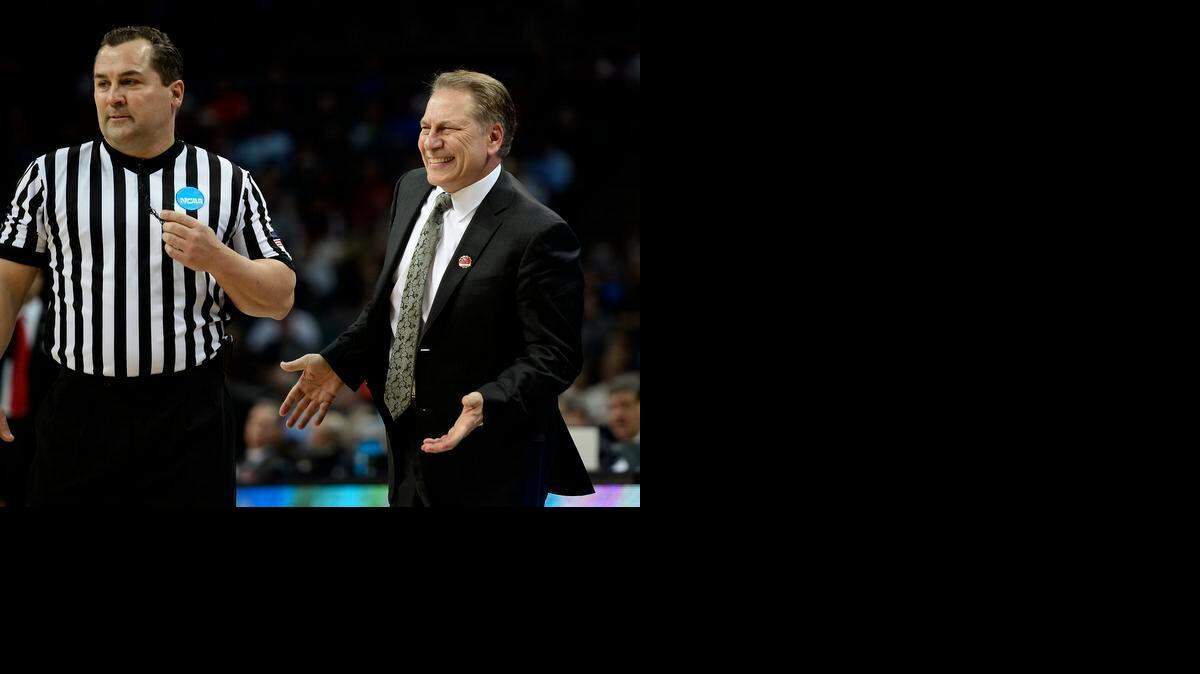 
Michigan State head coach Tom Izzo questions an official’s call during the Spartans’ victory over the Georgia Bulldogs on Friday at Time Warner Cable Arena in Charlotte.

