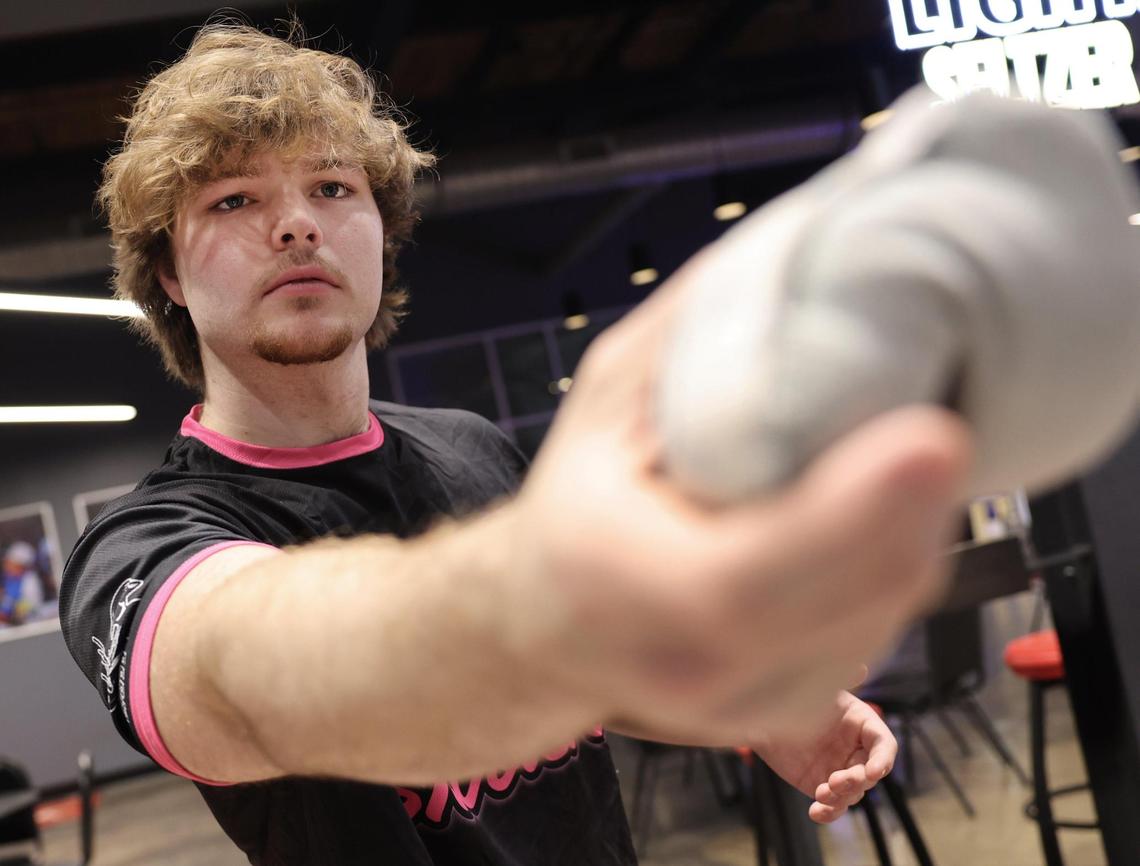 Luke Bryant prepares to throw a cornhole bag Wednesday at the American Cornhole League in Rock Hill.