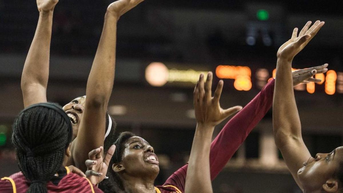 Winthrop forward Arianne Whitaker (14), battles for a rebound against South Carolina guard Shay Colley, right, during the first half Dec. 13 game in Columbia, S.C.