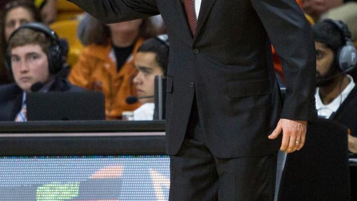 Winthrop coach Pat Kelsey gestures to his team during the first half of an NCAA college basketball championship game against UNC Asheville in the Big South Conference tournament in Buies Creek, N.C., Sunday, March 6, 2016.