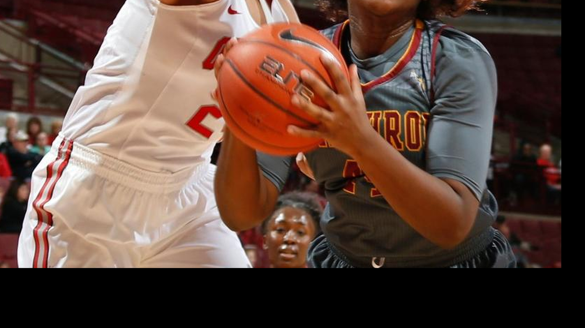 Teylahna Green (44) of the Winthrop Eagles grabs a rebound while guarded by Makayla Waterman (24) of the Ohio State Buckeyes on Wednesday at Value City Arena in Columbus, Ohio.