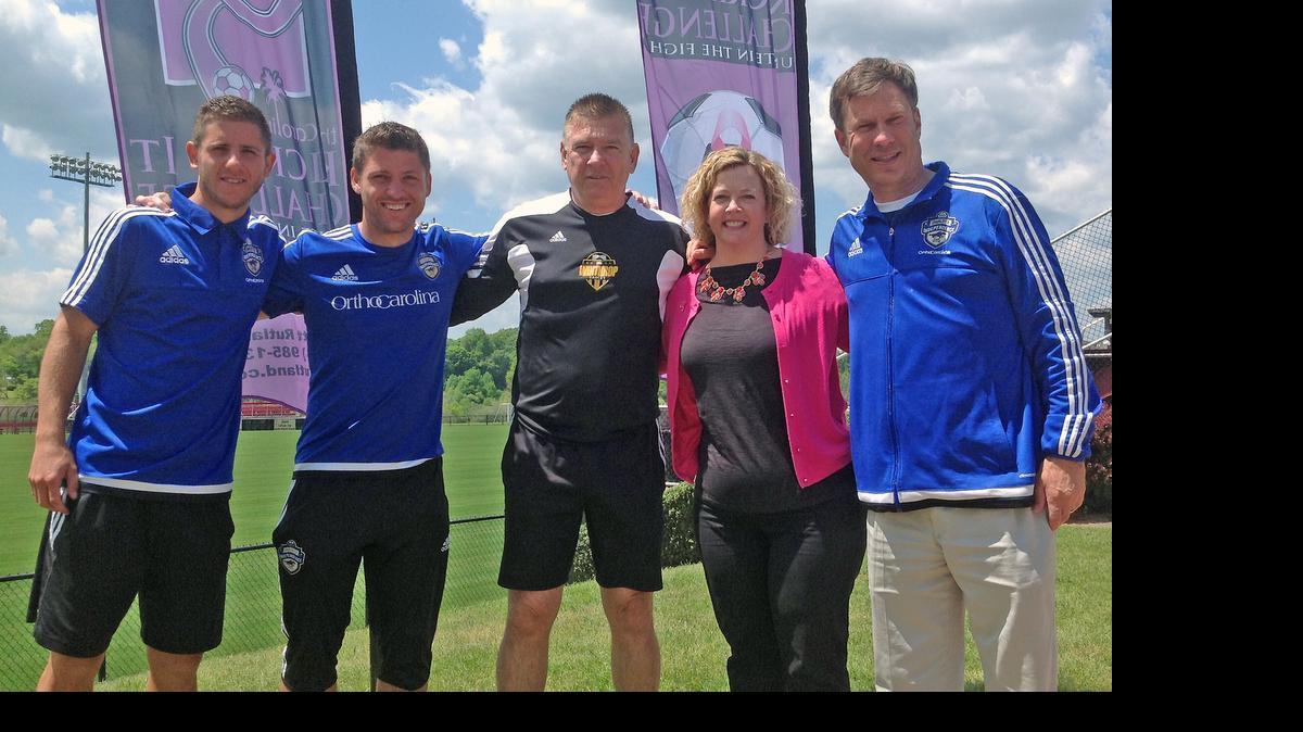 
The Charlotte Independence will play a USL Pro league game at Winthrop May 8. The game will be the first competitive match in Rock Hill for Alex and Enzo Martinez (from left). They were joined at the field Monday by Winthrop men's soccer coach Rich Posipanko, Sarah Morris of the Kickin' It Challenge soccer tournament, which is partnering with the Independence to raise money for cancer awareness and treatment, and Charlotte Independence general manager Tom Engstrom.
