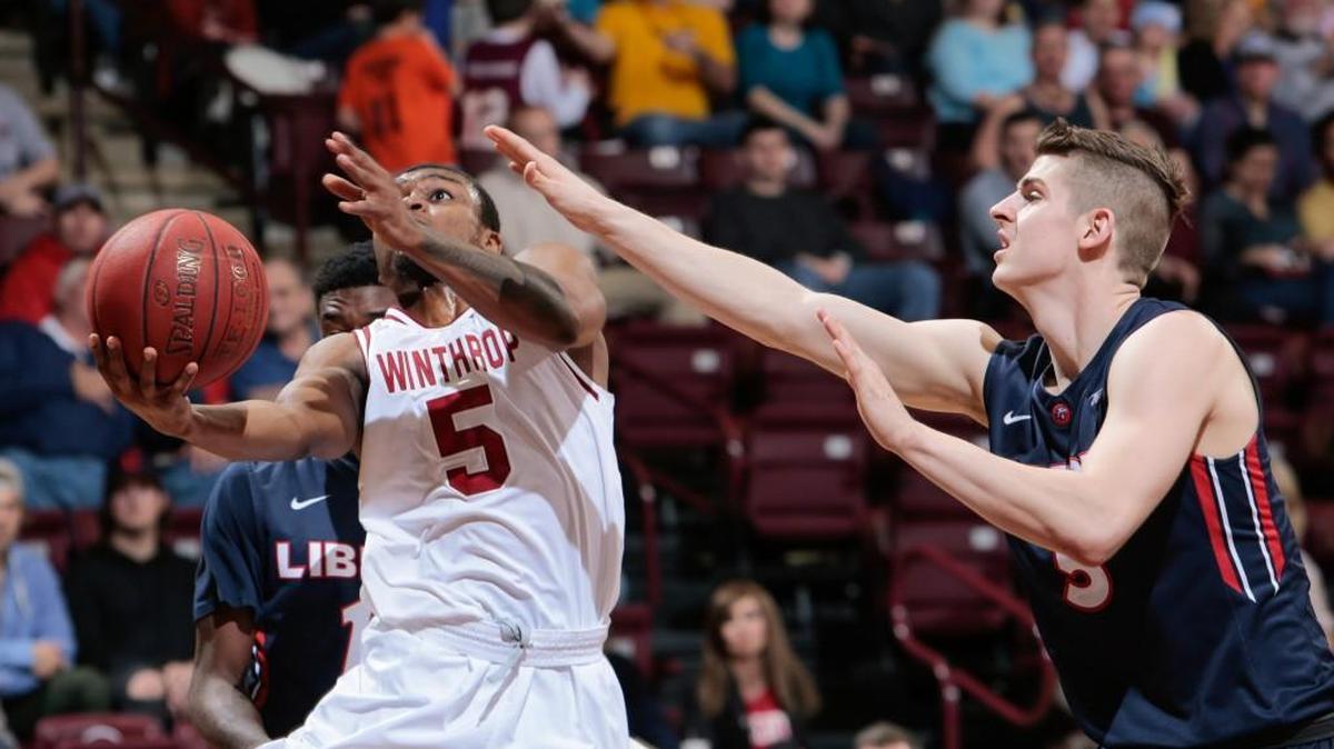 Winthrop's Keon Johnson drives to the basket as Winthrop hosts Liberty in Big South conference play Saturday.