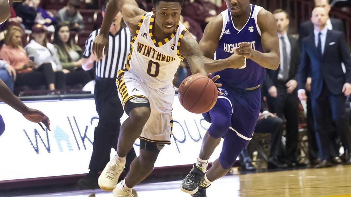 Winthrop's Nych Smith heads to the basket during the Eagles’ win over the Panthers Dec. 30, 2017.