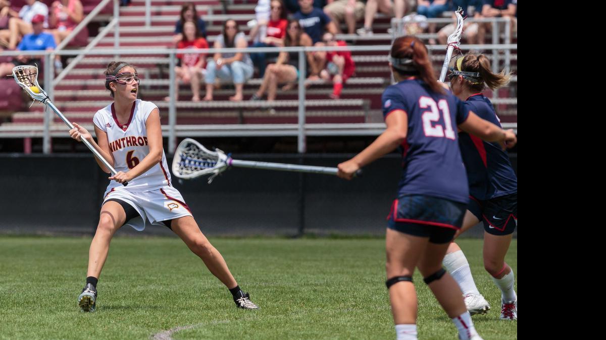 
Winthrop's No. 6 Shannon Gallagher looks for the shot as Winthrop defeats Liberty University for the Big South Conference title in women's lacrosse, 5-3-2015.
