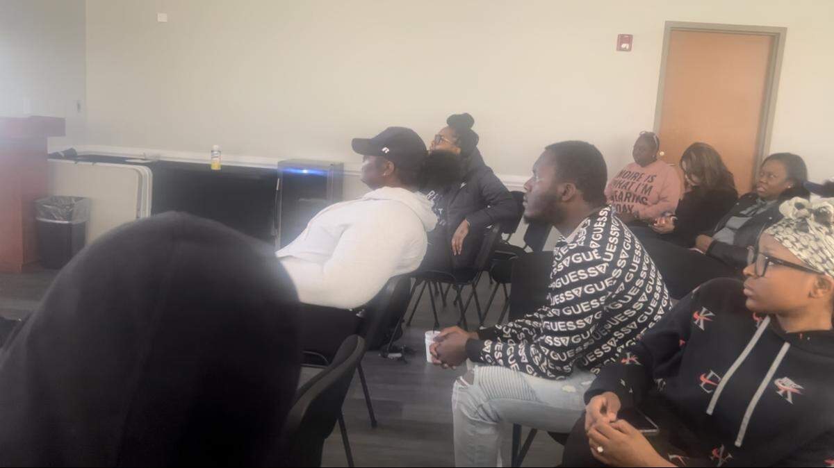 Members of Clinton College watch the Golden Bears compete against Bethel University in the NCCAA Division I Men’s Basketball Championship Final.