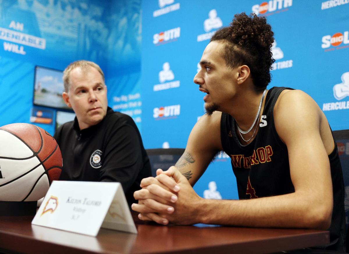 Winthrop University men’s basketball player Kelton Talford, left, talks about the upcoming season Tuesday at a press confrence as Head Coach Mark Prosser listens.