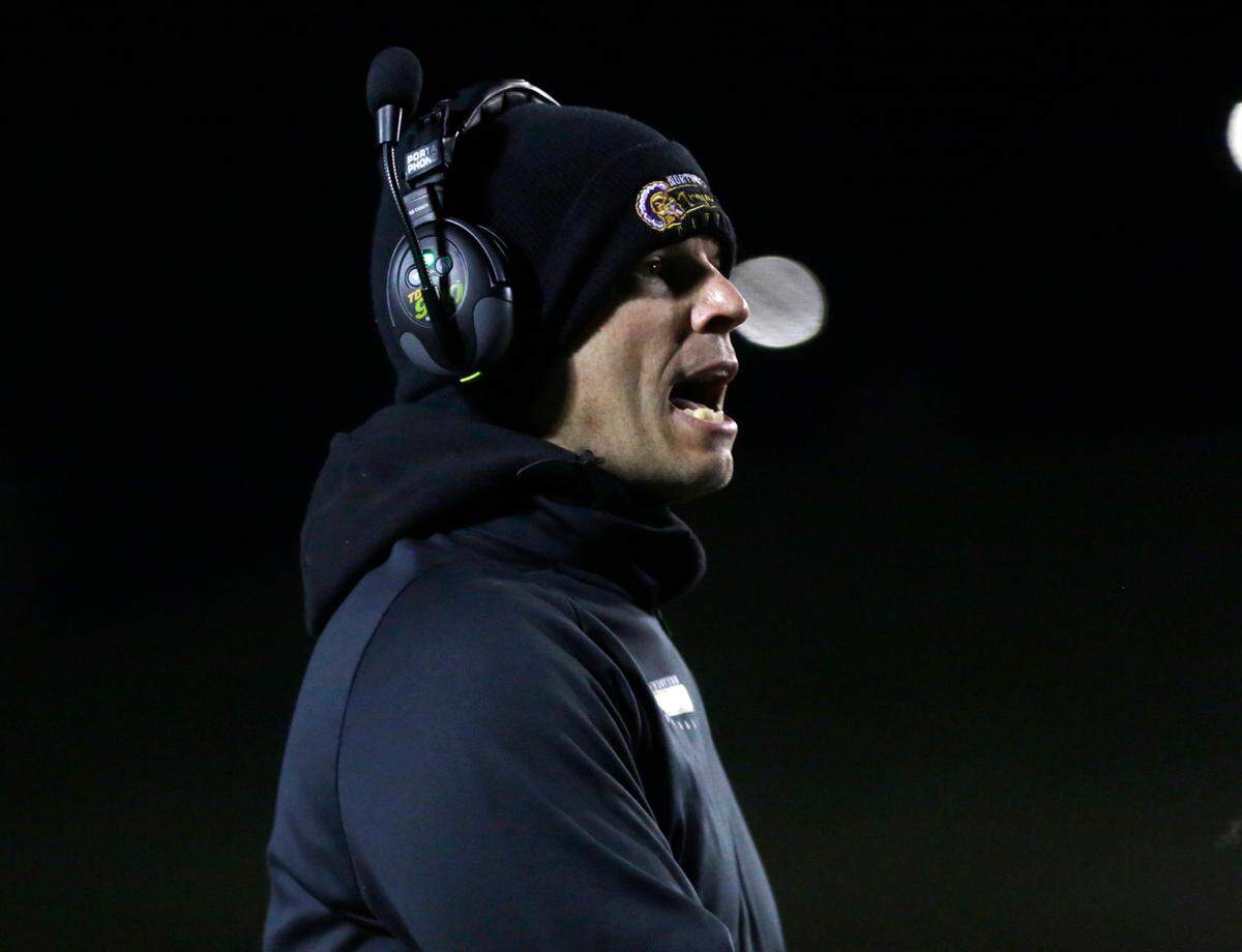 Northwestern High School varsity football head coach Page Wofford yells to his team Friday, Nov. 18, 2022 at the quarterfinals of the 4A state playoffs in Rock Hill.