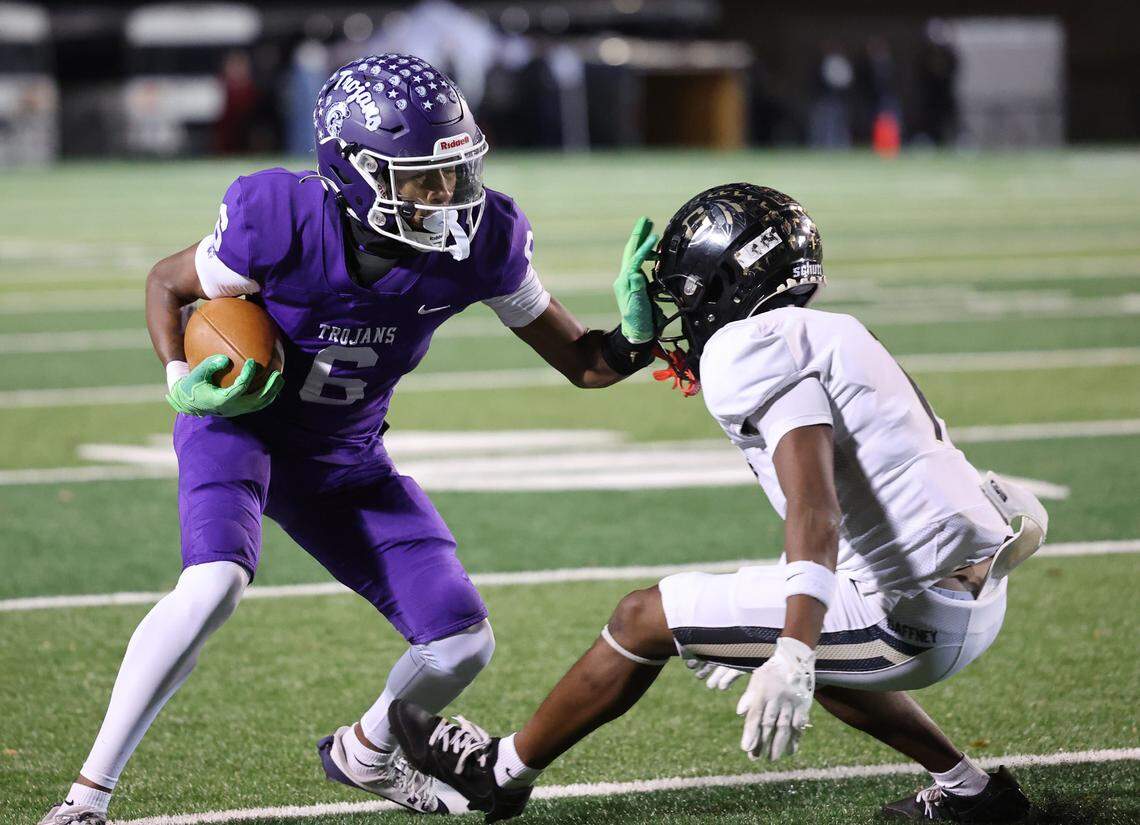 Northwestern’s Daniel Caldwell pushes back on Gaffney’s Jayden Sims Friday as the Trojans and Indians compete in Rock Hill.
