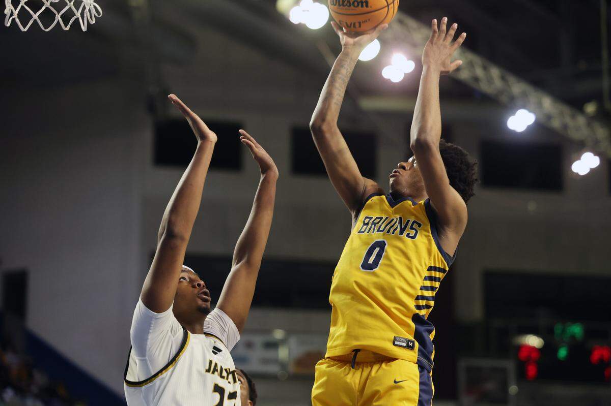 Lancaster’s Jordan Watford shoots the ball against North Augusta’s Jamison Mckenzie Friday at the Class 4A state championships in Florence