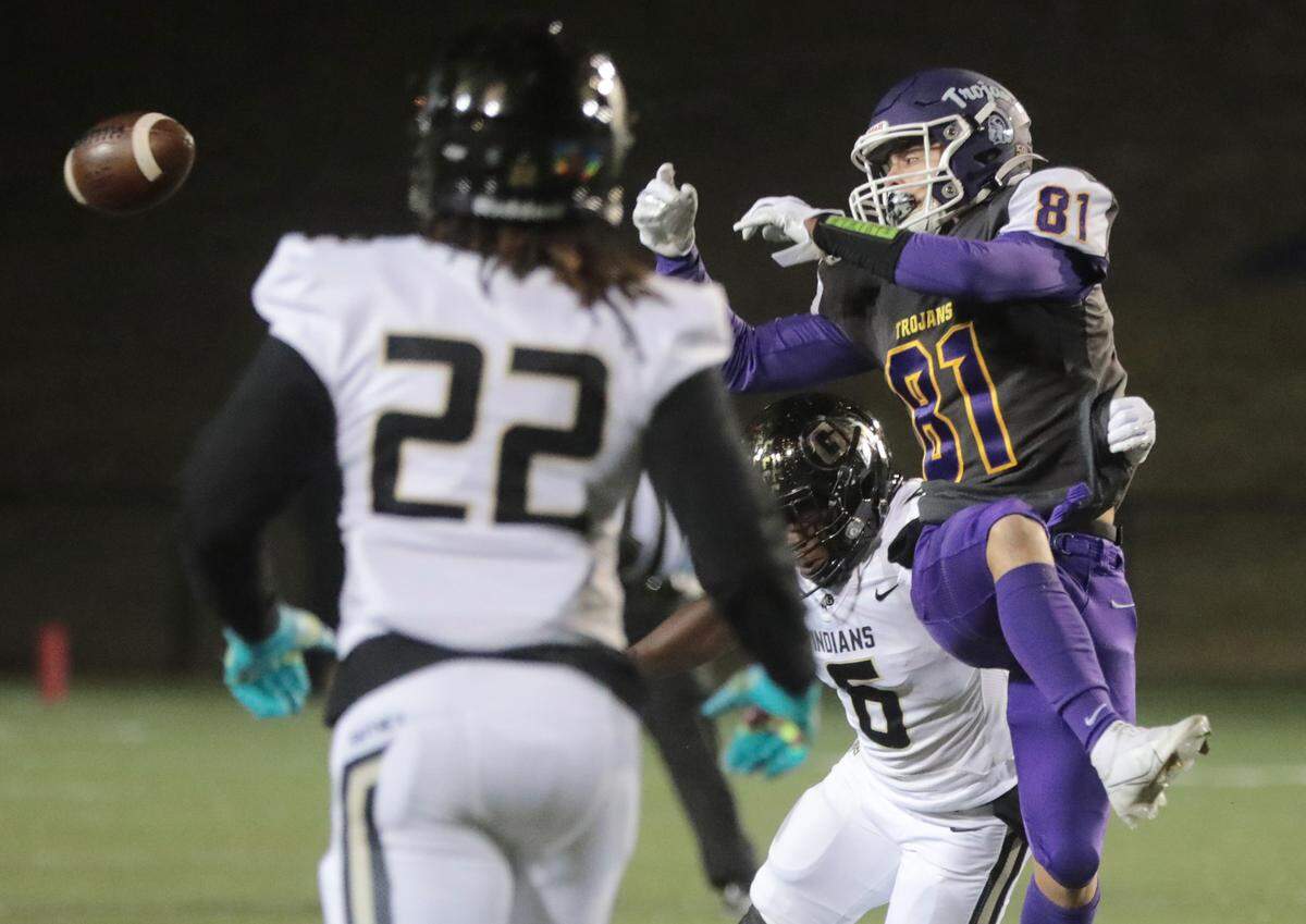 Northwestern’s Drennon Faile (81) and Gaffney’s Eddie Tate-McDowell (6) miss the ball.