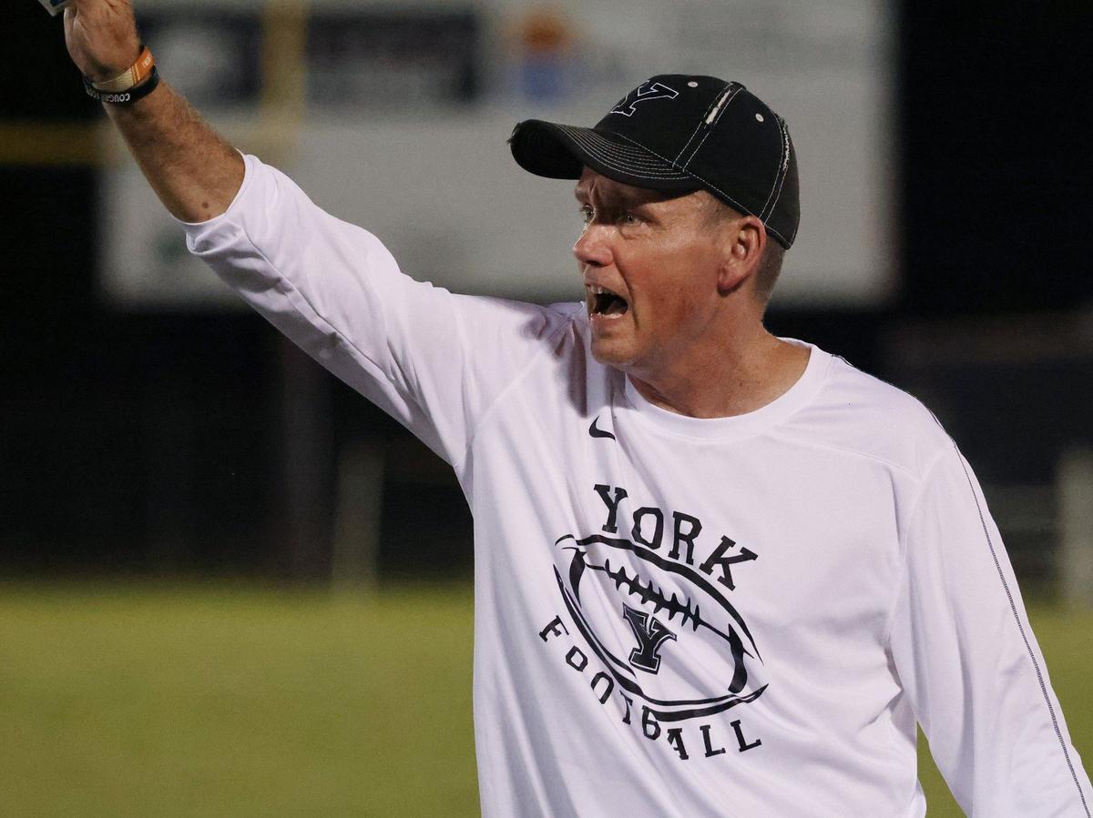 York Comprehensive High Sschool varsity football head coach Dean Boyd yells to his players Friday at a scrimmage in Union.