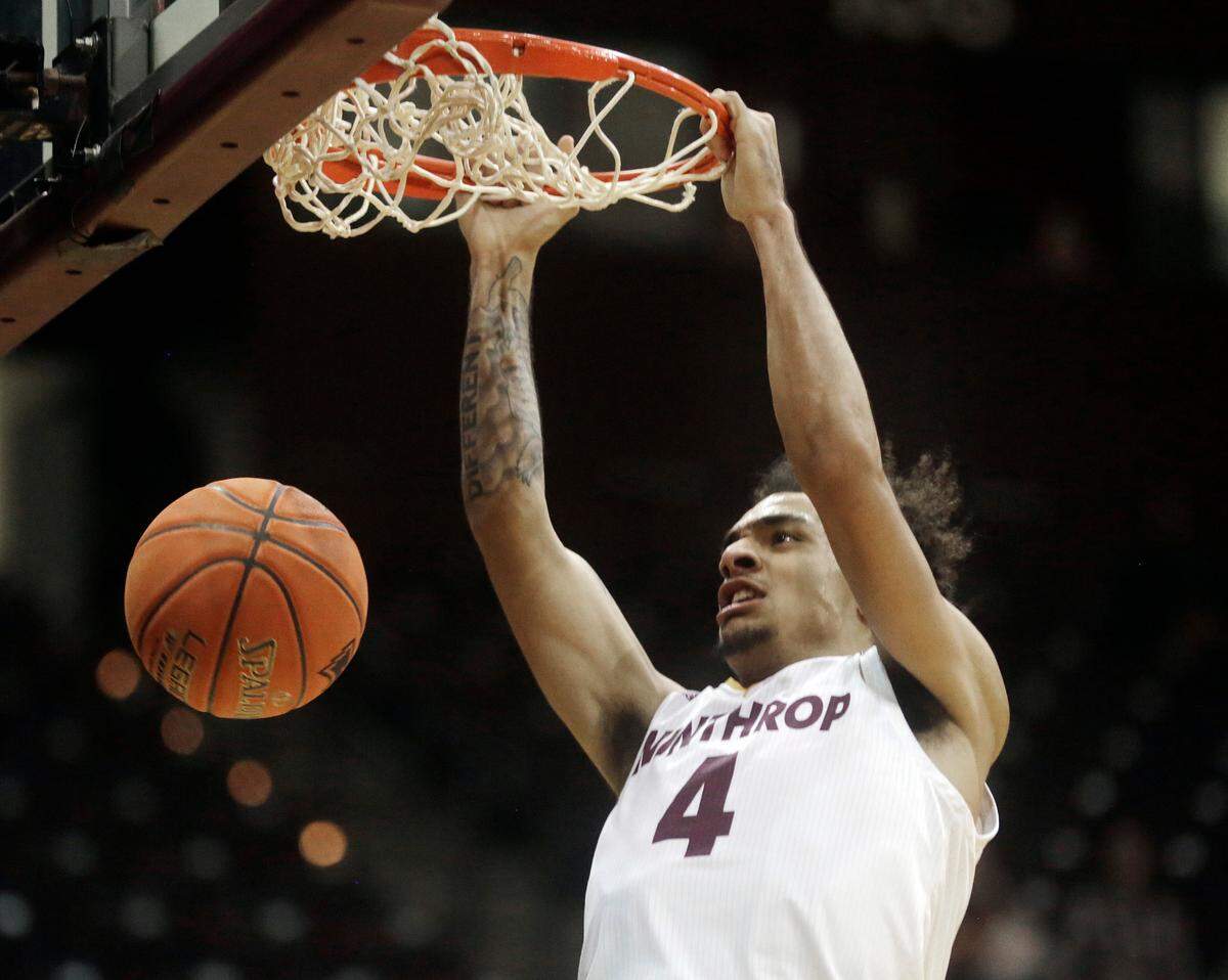 Winthrop’s Kelton Talford dunks the ball Wednesday as the Eagles take on Presbyterian College in Rock Hill.
