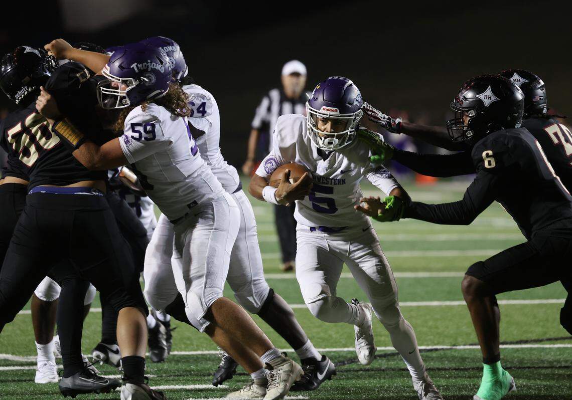 Northwestern's Xavier Means heads to the end zone as Rock Hill's K.T. Gill-McDonald (6) tries to stop him Friday, Oct. 17, 2025 in Rock Hill, S.C.
