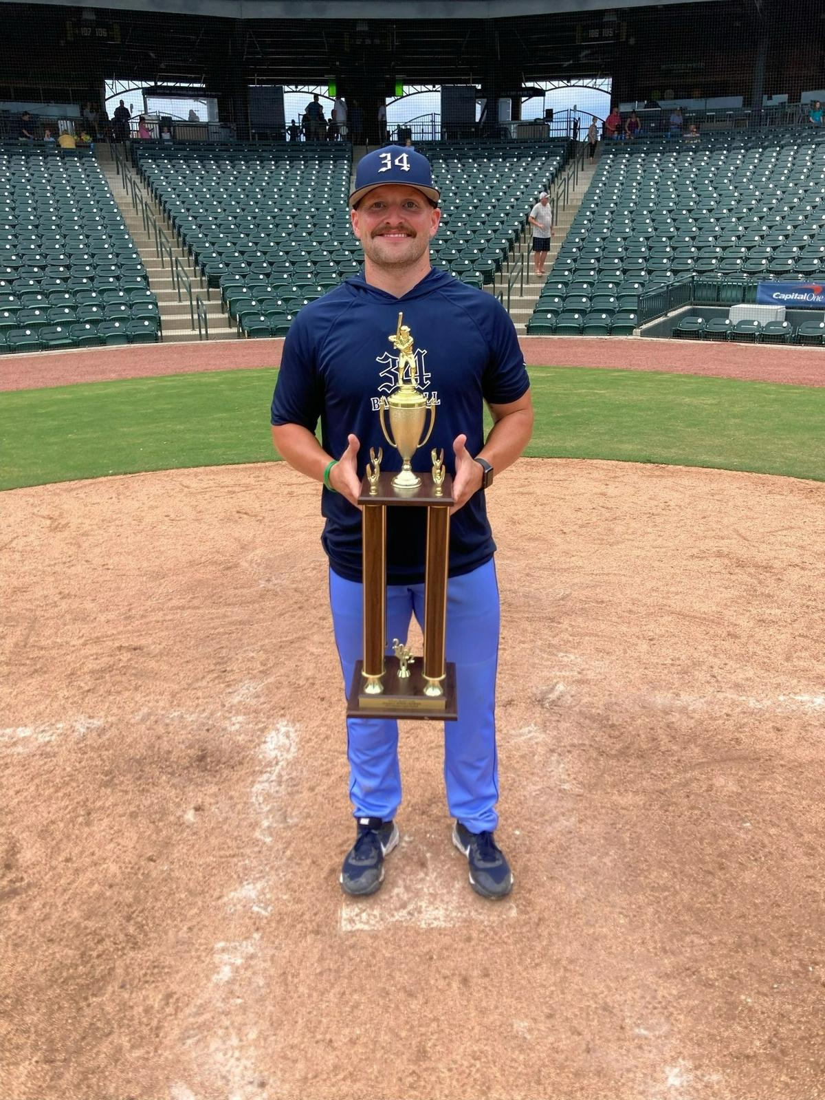Rock Hill Post 34 defeated Camden for an American Legion baseball state title on Saturday, July 30, 2022. Here’s head coach Jeremy McCoy with the championship trophy.