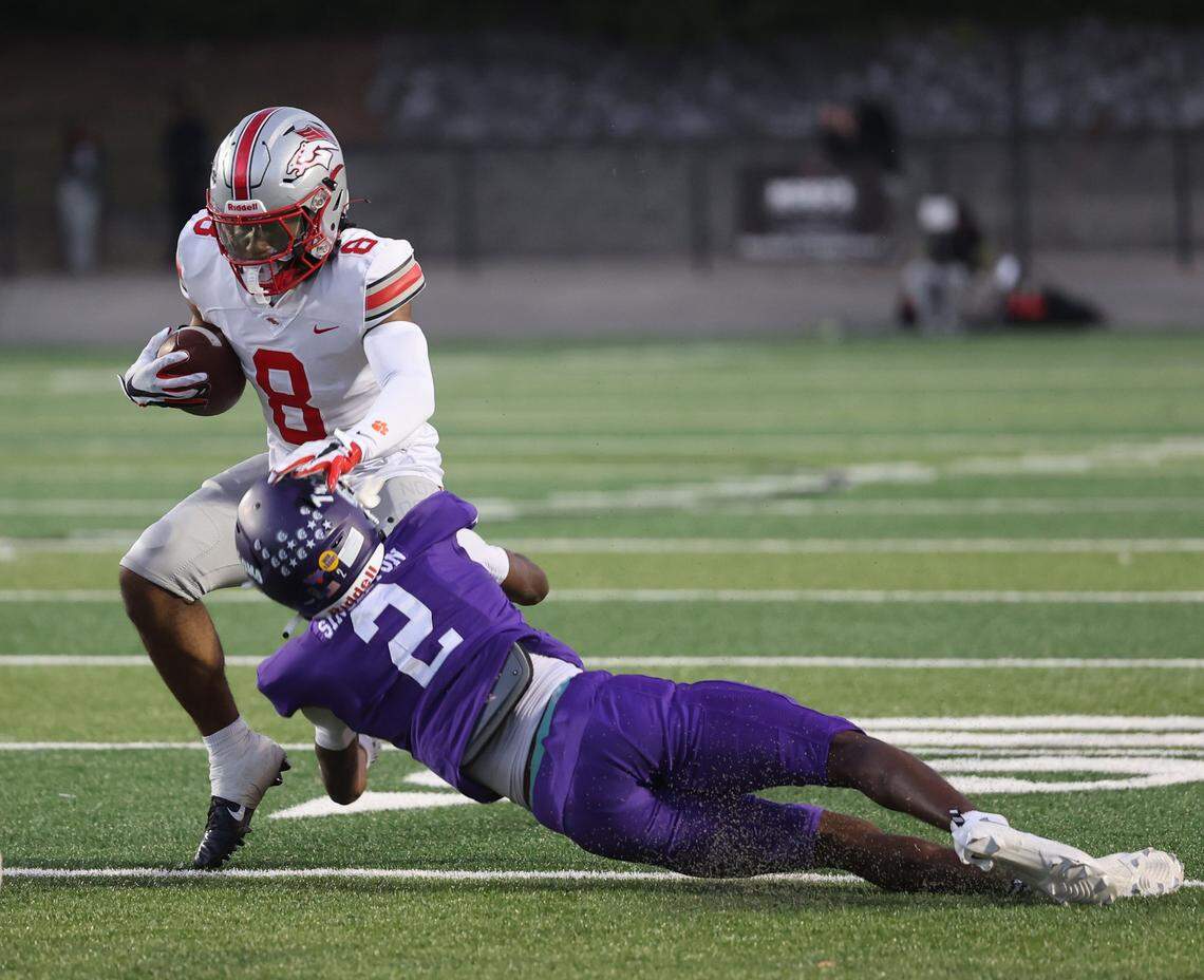 Northwestern's Josh Singleton tackles  South Pointe's Kadin Watkins at the cross-town rivalry game in Rock Hill, S.C. on Friday, Sept. 12, 2025