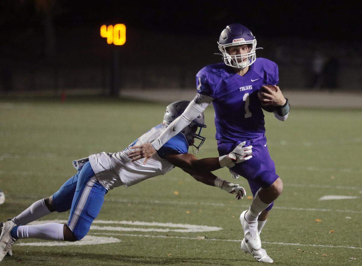 Northwestern quarterback Will Mattison runs past Byrnes’ Bryson Landrum.
