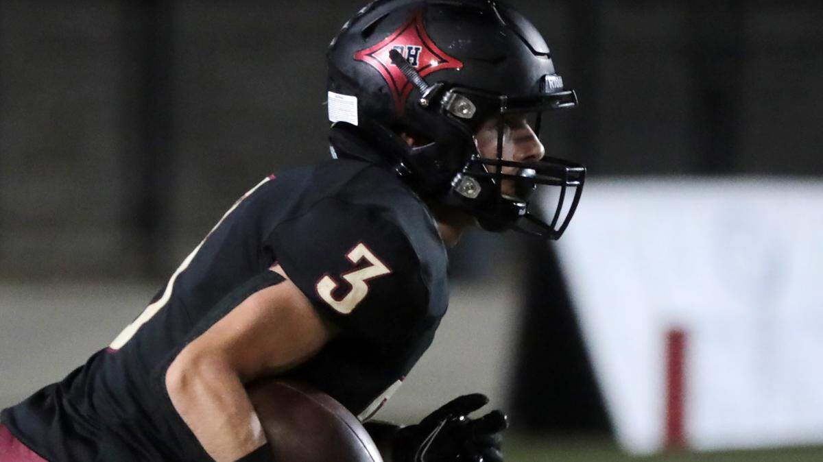Rock Hill’s Nathan Bruce carries the ball.