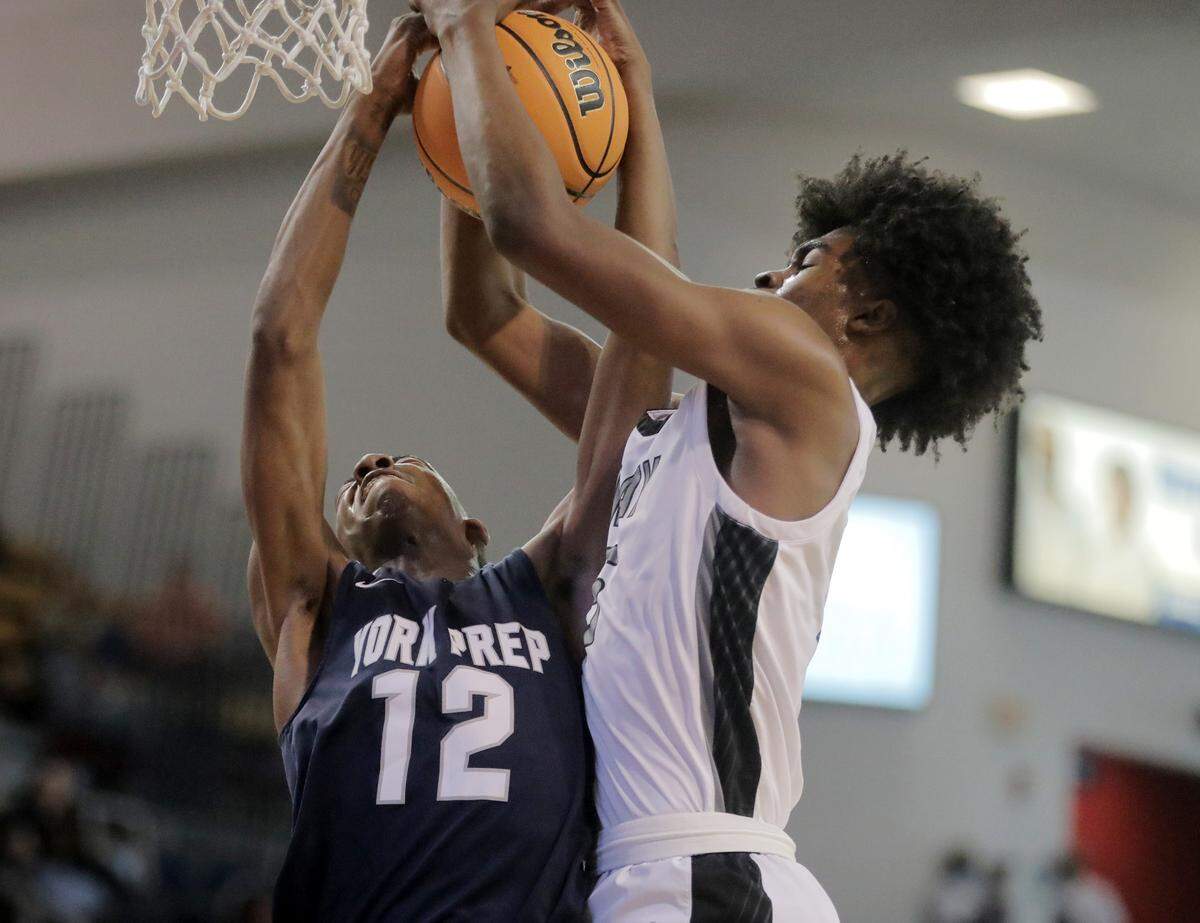 York Prep’s Ji’Meion Brown and Gray’s Avante Parker fight for the ball.