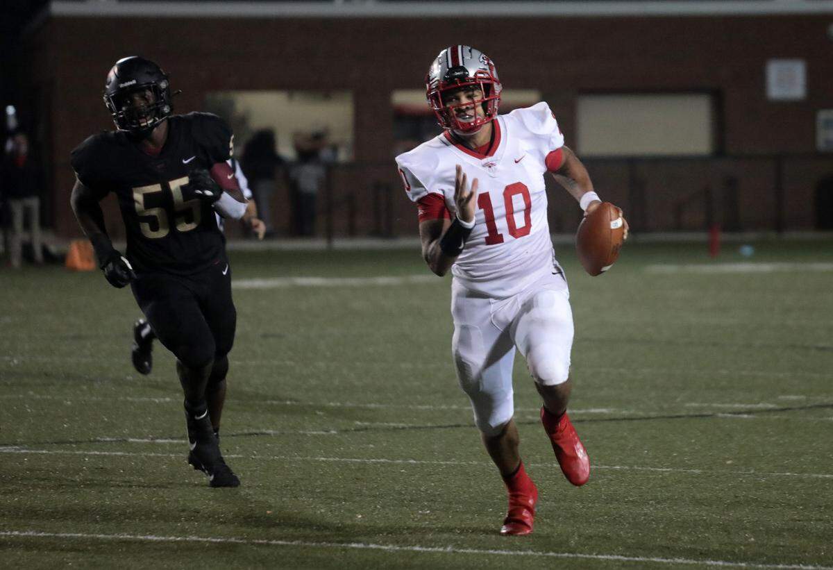 South Pointe’s Nebanye Moore (10) leaves Rock Hill’s Maurice Bonneau Jr. behind Friday as the Bearcats and Stallions meet at District Three Stadium.