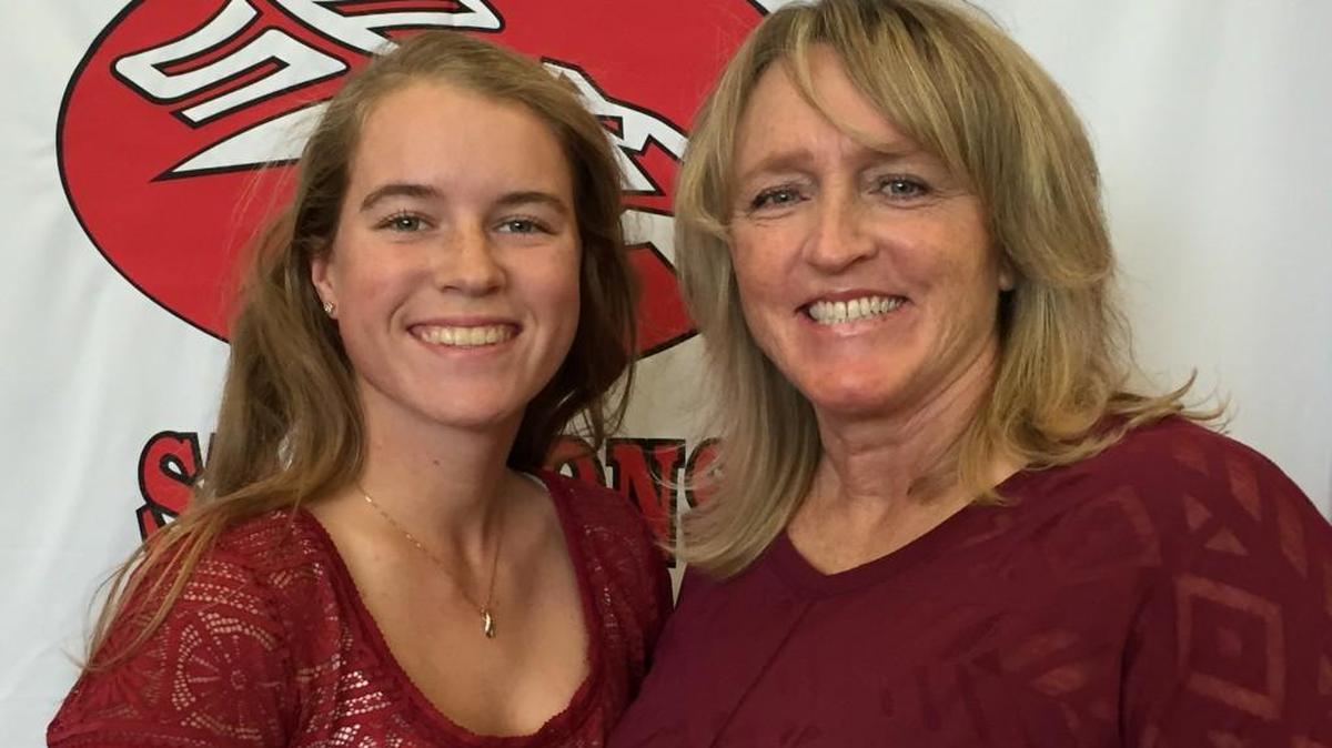South Pointe senior golfer Whitney Carter and Stallions coach Kimberly Case.